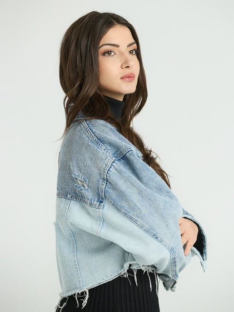 Cropped denim jacket with oversized silhouette