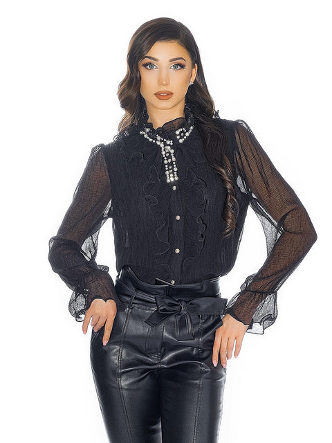Black women's shirt decorated with pearls and stones