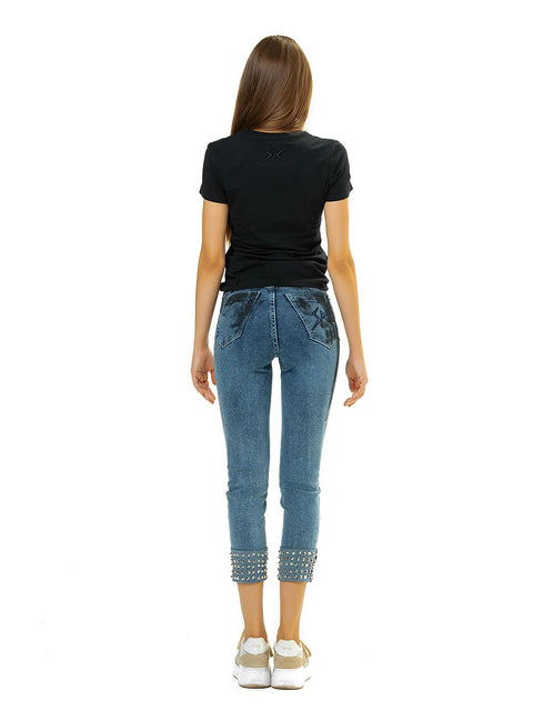 Slim jeans with eyelets and art elements