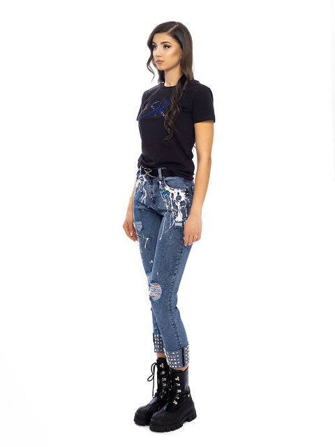 Jeans with art elements and eyelets