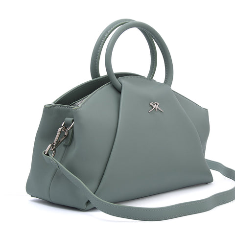 Elegant women's handbag made of genuine leather with a long shoulder strap in soft green