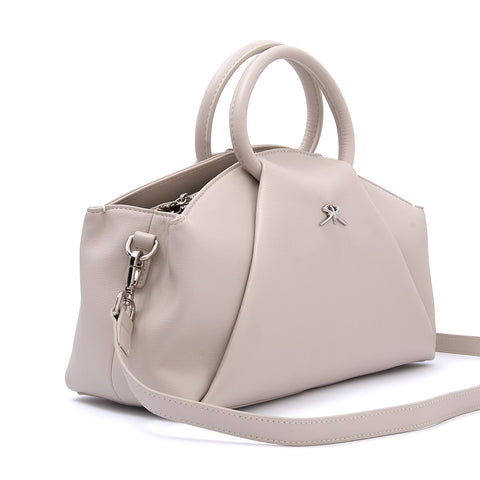 Elegant and stylish women's handbag made of genuine leather with a long shoulder strap in soft white