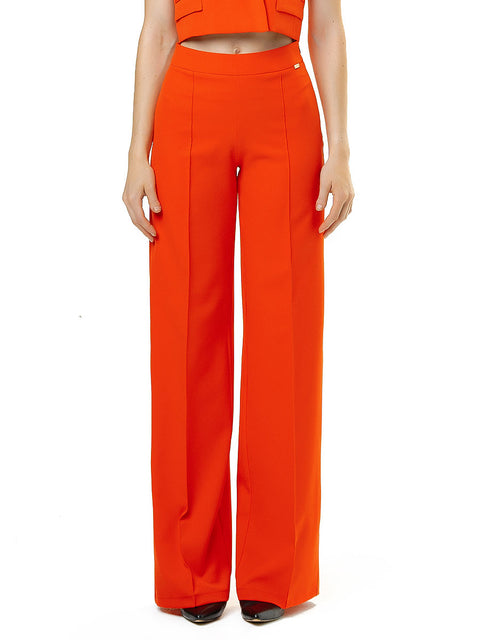 Elegant blazer and pants suit in orange