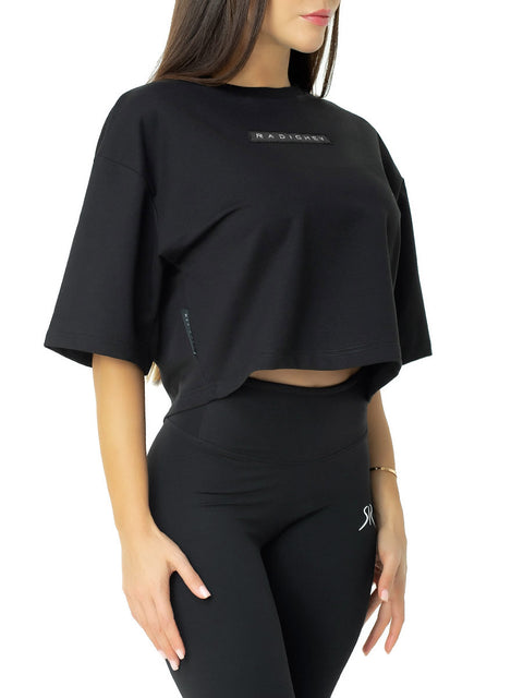 Short black T-shirt with leather emblem