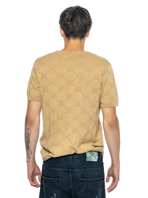 Knitted beige blouse with all-over print of small logos and merino wool