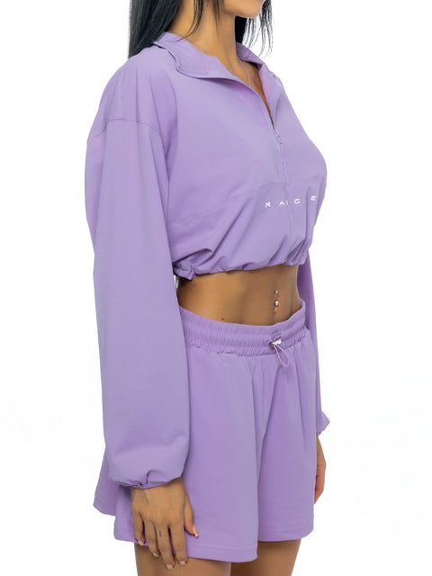Short sports top in purple with inscription and logo