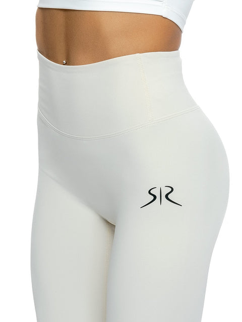 White leggings with lifting effect and logo
