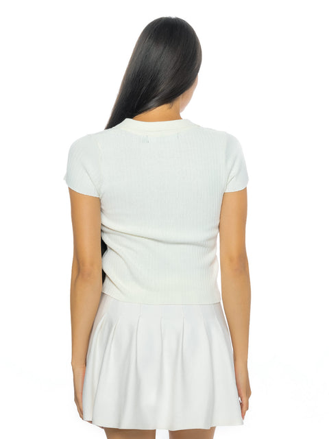 Short cream knitted blouse V-neck polo without buttons with metal logo