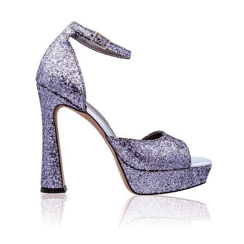 Comfortable shoes with large silver brocade and a purple hue