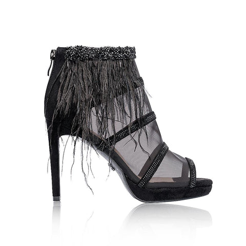 Mesh boots with a decoration of natural feathers